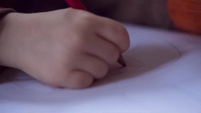 Close up of hand of drawing child. Full HD RAW video.