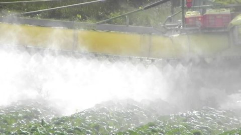 agriculture toxic tractor spraying pesticides crops fertilize organic duster