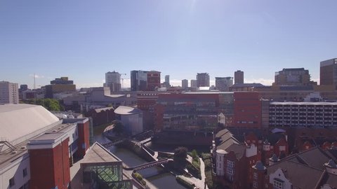 4K & HD Aerial Video clip of Brindley place and Canals, crane shot, with city landscape of Birmingham UK.