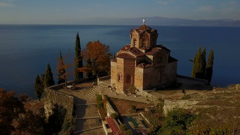 OHRID, MACEDONIA - OCTOBER 2017: Aerial view of iconic Orthodox Church built on a cliff at lake Ohrid in Macedonia