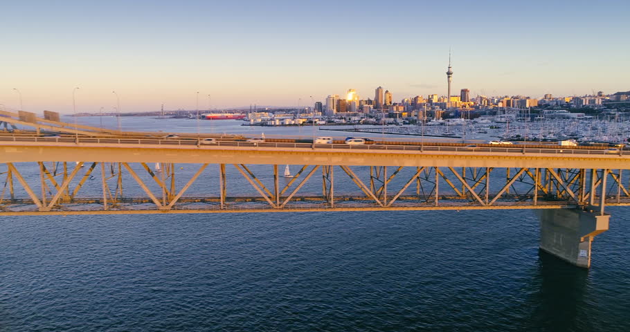 Aerial Shot Of Auckland Harbour Bridge, Sailboats, Westhaven marina & City Skyline, New Zealand