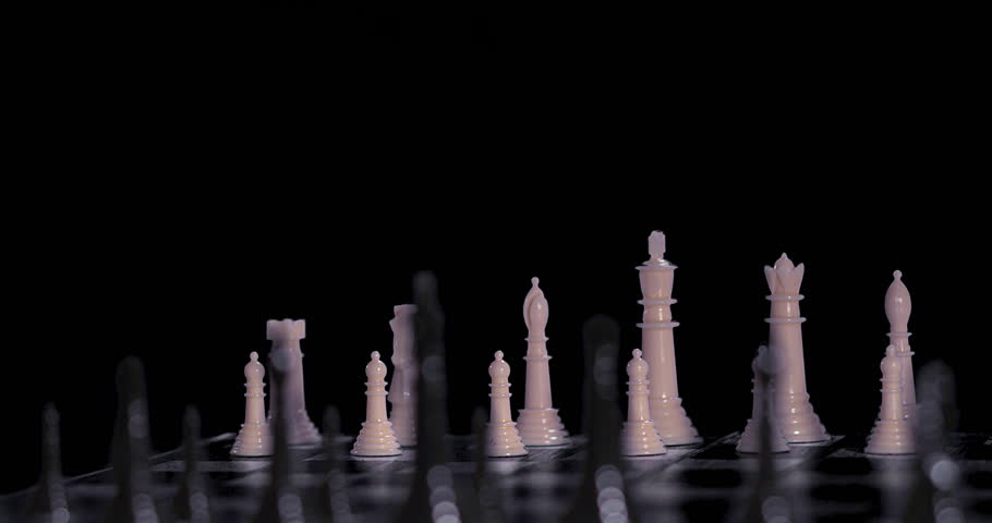 Chess white pieces row track jib shot
