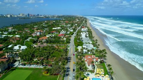 Beautiful aerial tour Palm Beach Florida oceanfront luxury real estate mansion homes and waves