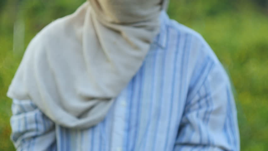 Farmer hands gesture for using user interface and mobile technology with blank space for cyber and futuristic concept in nature farm