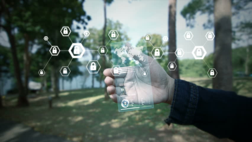 Hand of woman holding clear hologram with user interface and hexagon shape lock icon for network security padlock cyber futuristic technology concept | Shutterstock HD Video #1008640105