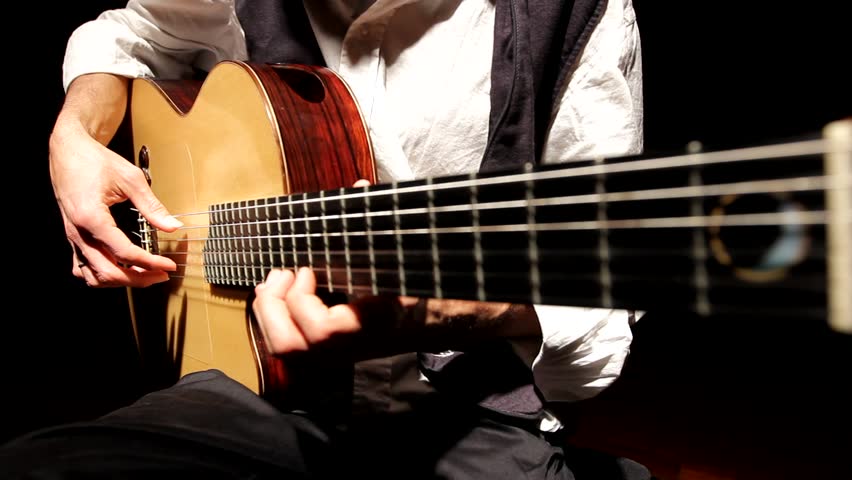 Man playing Acoustic guitar music musical musician flamenco band jazz Spain Royalty-Free Stock Footage #1008655651