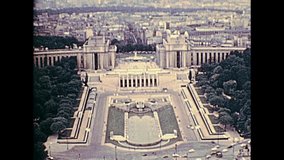 Palais de Chaillot palace in the 70s with Jardins du Trocadero from Paris Eiffel Tower. Aerial view panorama of Paris. Historic archival footage from 1976 in France.