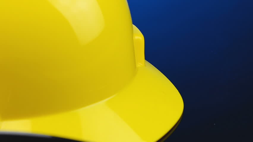 Construction Gear on Tabletop with Hardhat  Royalty-Free Stock Footage #1008672685