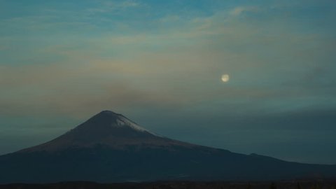 incredible time lapse of the popocatepetl volcano and full moon at sunrise