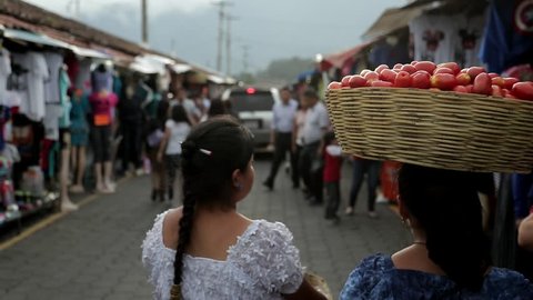 ANTIGUA GUATEMALA, MARCH 2017:Guatemala Antigua fair market. Crowd of people walking on busy street 