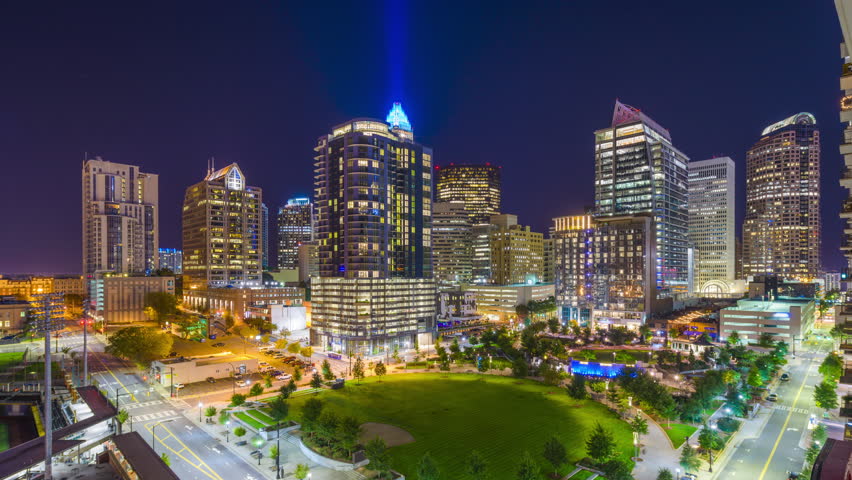 Charlotte, North Carolina, USA uptown park and skyline.