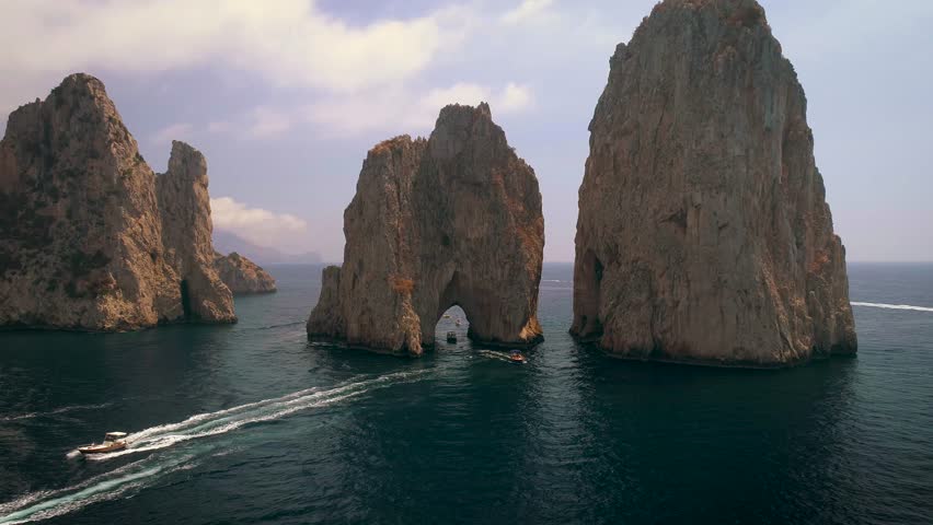 Faraglioni off the coast of Capri, Itlay Royalty-Free Stock Footage #1008691489