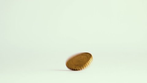 Spinning coin on white background