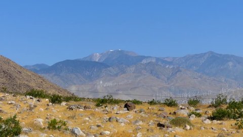 Wind turbines generating electricity at a desert wind farm near Palm Springs, California, USA