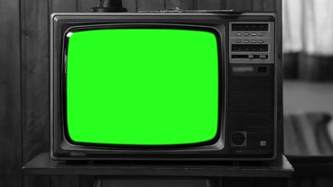 90s TV with Green Screen. Black and White. Zoom In Slow. You can replace green screen with the footage or picture you want with “Keying” (Chroma Key) effect in AE (check out tutorials on YouTube).