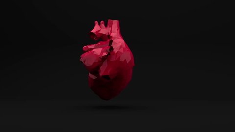 The red polygon heart beats. Computer three-dimensional graphics. Slow rotation of the object.