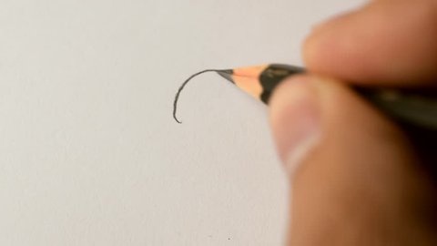 Writing Question Mark with Graphite Pencil - close-up