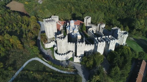 Aerial view of Manasija monastery protected by fortified walls in mountains in Serbia