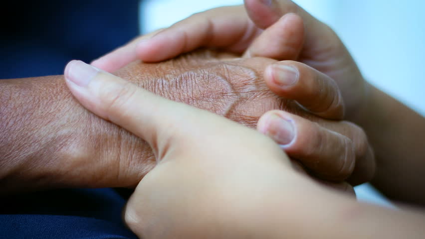 Hands of young woman holding and gentle touch to Hands of old women metaphor and concept for body language feeling love soothe and hope of family old mother and young daughter | Shutterstock HD Video #1008713713