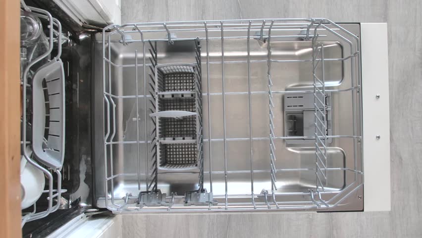 Filling dirty dishes in the dishwasher.Timelapse, 4K | Shutterstock HD Video #1008720512