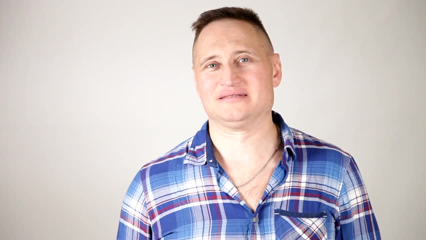 Male emotions, facial expressions, signs. Man speaking