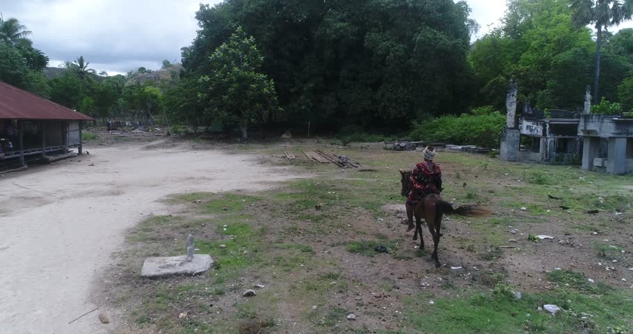 Low Flying Following Horse Walk Around Pao Village, Sumba, Indonesia 