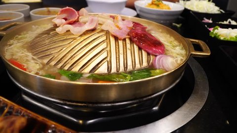 korean style bbq Sliced of fat meat on Brass Pan, Korean Wok Barbecue Bbq Grill Pan