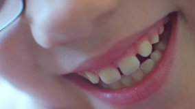 smile of a child of school age closeup.1920X1080 FullHD video