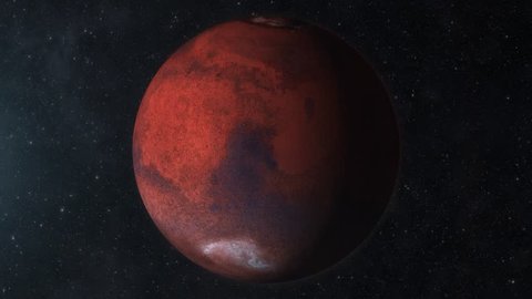 Traveling to the red planet Mars in space. The day/night terminator is visible as the Mars rotates.  	