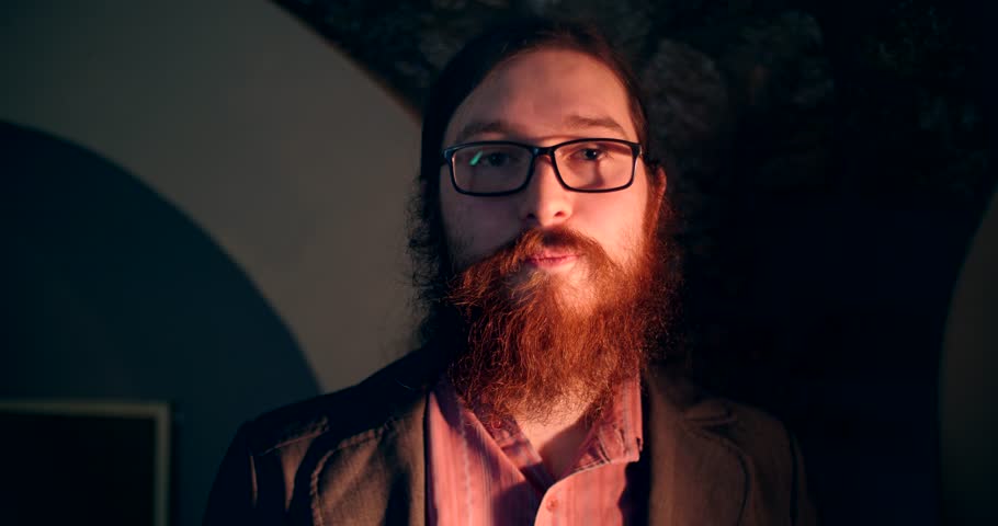 Red-haired beard is smoking a pipe and disappears 4k magic focus | Shutterstock HD Video #1008748154