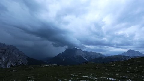 National Nature Park Tre Cime In the Dolomites Alps time lapse. Beautiful nature of Italy flights lightning and storm.