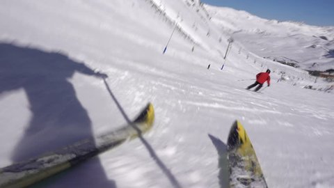 Skier Rips Down Slopes of Mountain and Falls Down