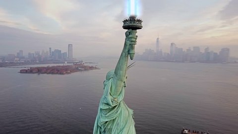 Aerial view of Statue of Liberty with Light saber 4k