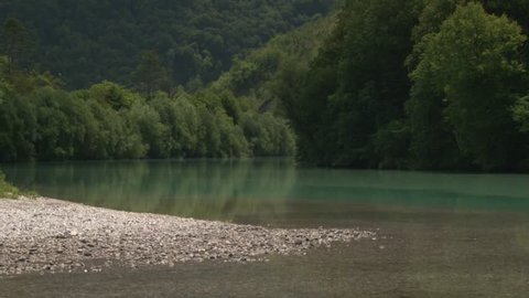 River Soca Slovenia. Nature, water, river, trees, plants.