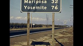 Highway to Yosemite NP. Half Dome in the Yosemite National Park in California state, United States. Vintage Archive footage in circa 1980.