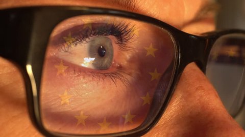 The new EU-regulation "General Data Protection Regulation" (Gdpr) takes effect in May 2018. Info. on a screen reflected in a womans glasses