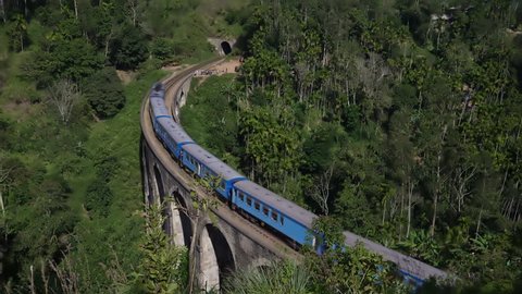 Train goes along the Nine Arches Bridge in Sri Lanka.
