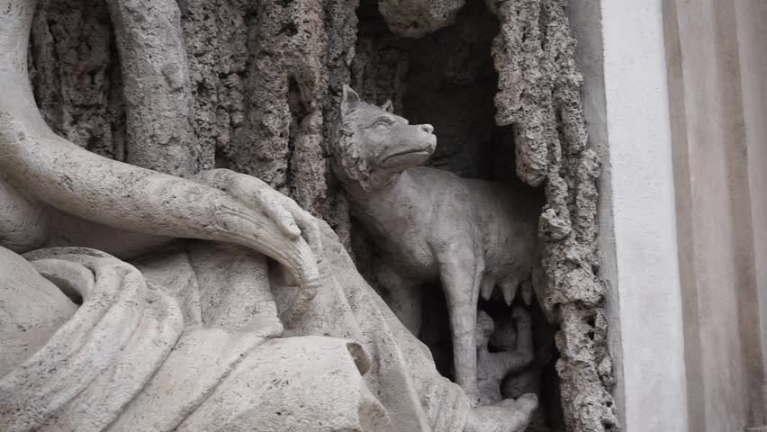 fountain of Rome with bearded male figure and wolf
