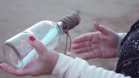High quality video of removing message from the bottle in real 1080p slow motion 250fps 