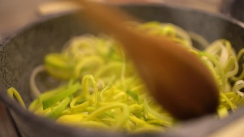 Cooking risotto with leek, Italian style