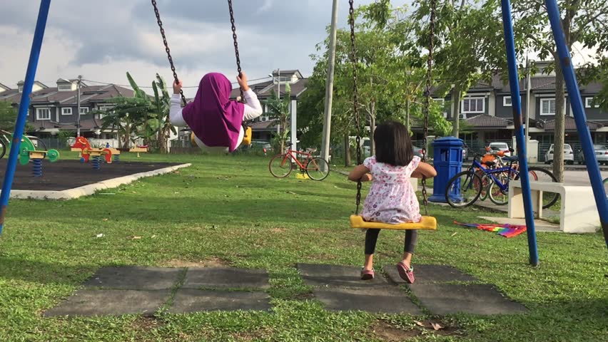 Video of a slow motion at a swing at children park
