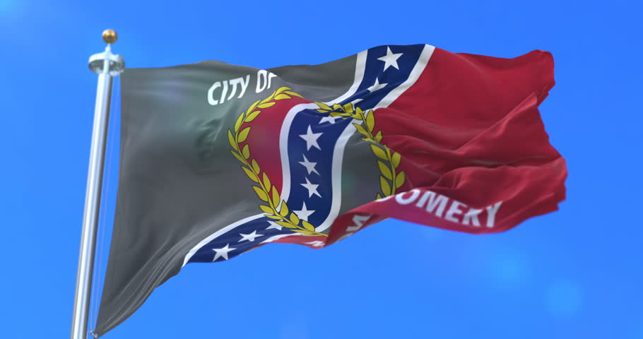 Montgomery city flag, city of Alabama in USA or United States of America, waving at wind in blue sky, slow - loop