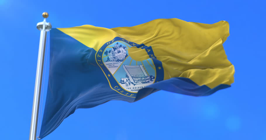 Santa Ana city flag, city of California in USA or United States of America, waving at wind in blue sky, slow - loop