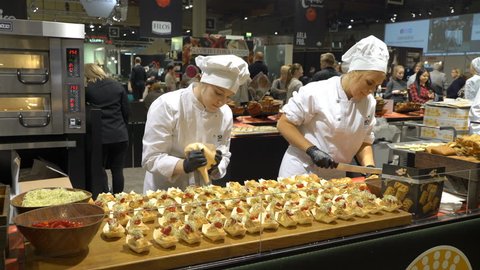 HELSINKI, FINLAND - MARCH 18,2018: The chefs prepare food samples and treat visitors during the Show Gastro Helsinki - big trade fair for the hotel, restaurant and catering industry