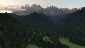 Santa Magdalena Dolomites, Italy - July 20, 2017: Aerial Drone video of Santa Magdalena St Maddalena Val di Funes in Dolomites Italian Alps with Furchetta mountain peak on the background