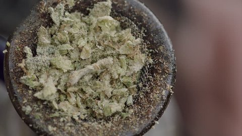 smoking cannabis in a water pipe close-up 200fps