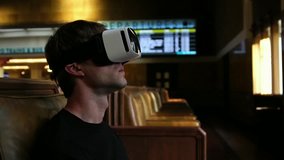 Young tourist man wearing VR headset Virtual Reality Glasses for travel entertainment 
 - Powered by Shutterstock - Get 15% off with code: PIKWIZARD15