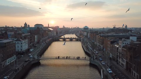 aerial view of city center of Dublin with river Liffey during sunset