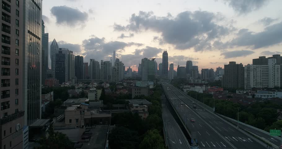 SHANGHAI, CHINA - Sep 27: Aerial View of Yanan Rd, Jingan district, Shanghai in the dawn on a cloudy day, on 27 Sep 2017 in Jingan district, Shanghai, China.