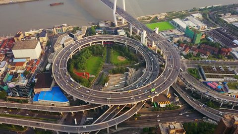 SHANGHAI, CHINA - SEPTEMBER 8, 2017: sunset time shanghai city famous traffic round road junction aerial panorama 4k circa september 8 2017 shanghai, china.
